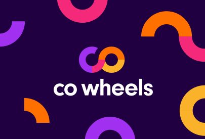 Co Wheels livery and branding on white car in showroom